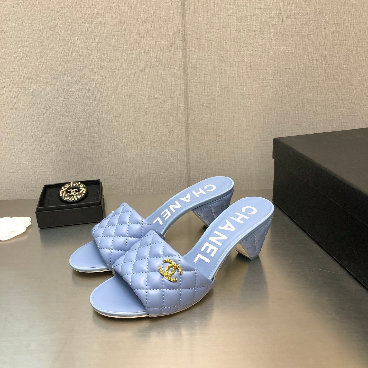 CHANEL DIAMOND-QUILTED 6 CM SANDALS IN CAROLINA BLUE LAMBSKIN