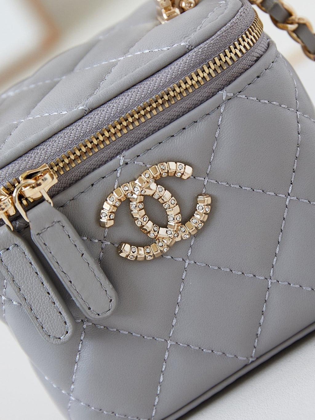 CHANEL 25S MINI VANITY BAG 11 CM IN GREY LAMBSKIN WITH CRYSTAL-EMBELLISHED  LOGO