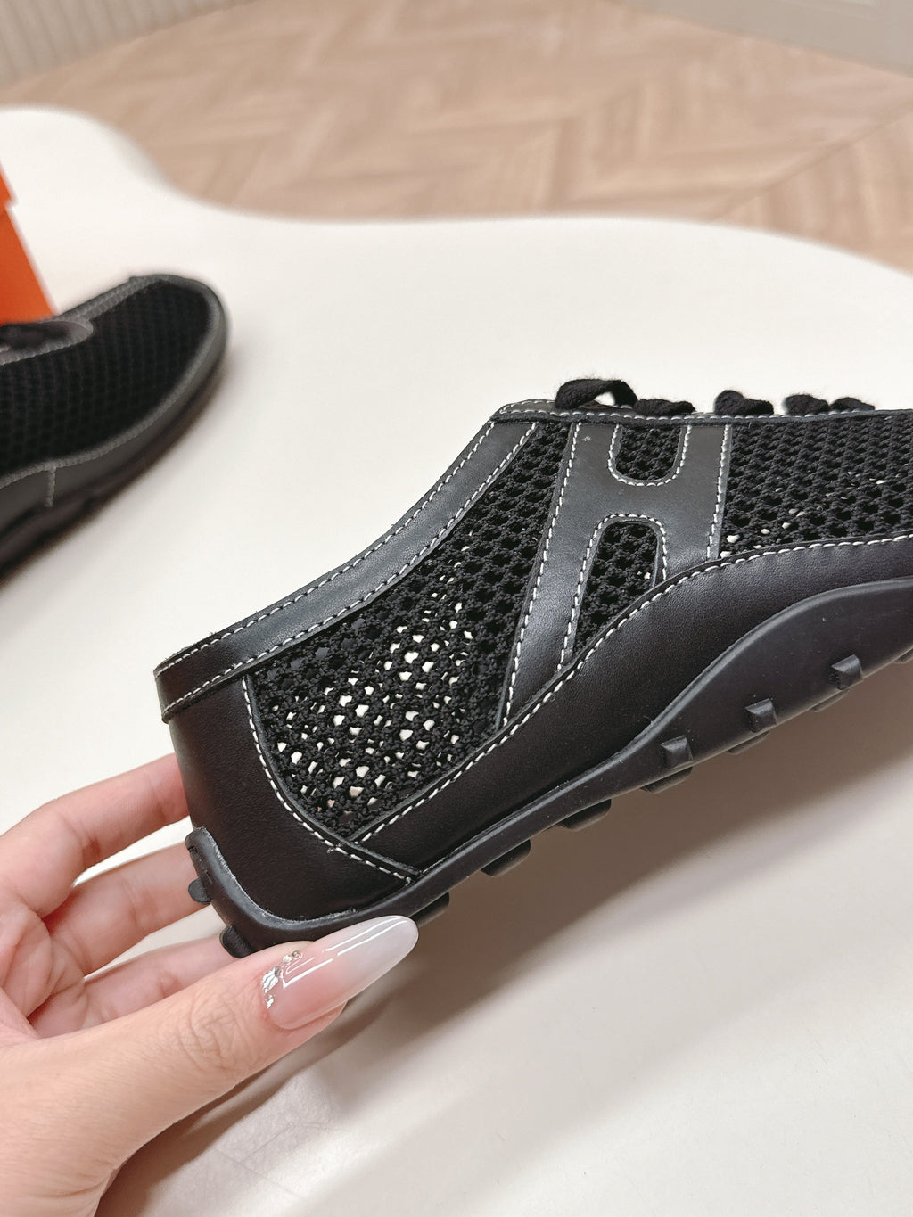 HERMES KIGA SNEAKER IN BLACK CROCHET KNIT AND CALFSKIN
