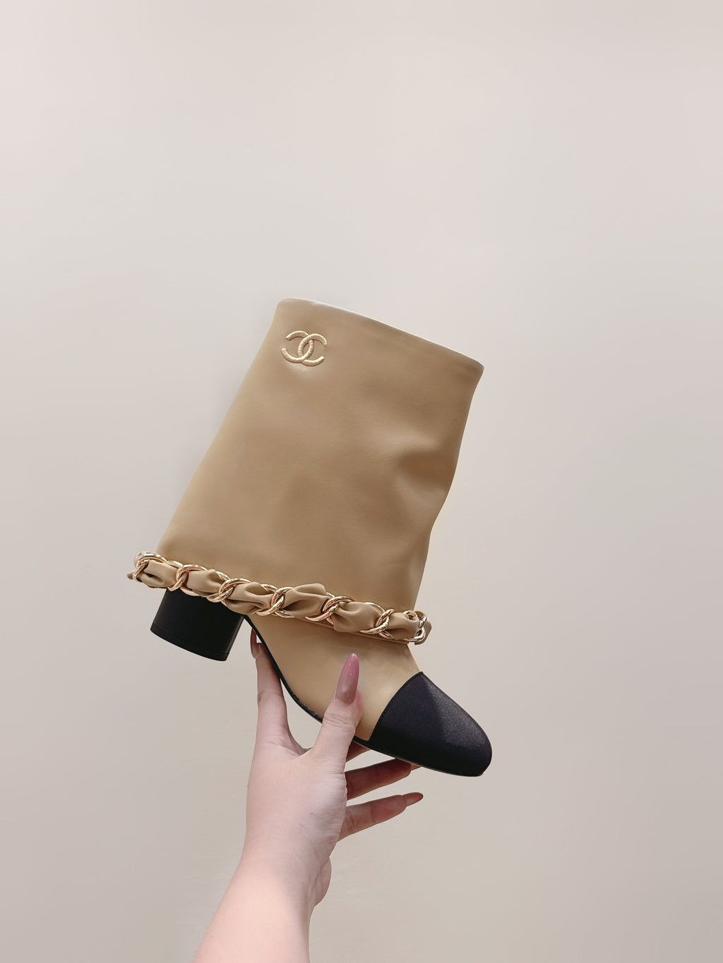 CHANEL 25S CALF-LENGTH BOOTS 45MM IN BEIGE AND BLACK CALFSKIN GOLD HARDWARE