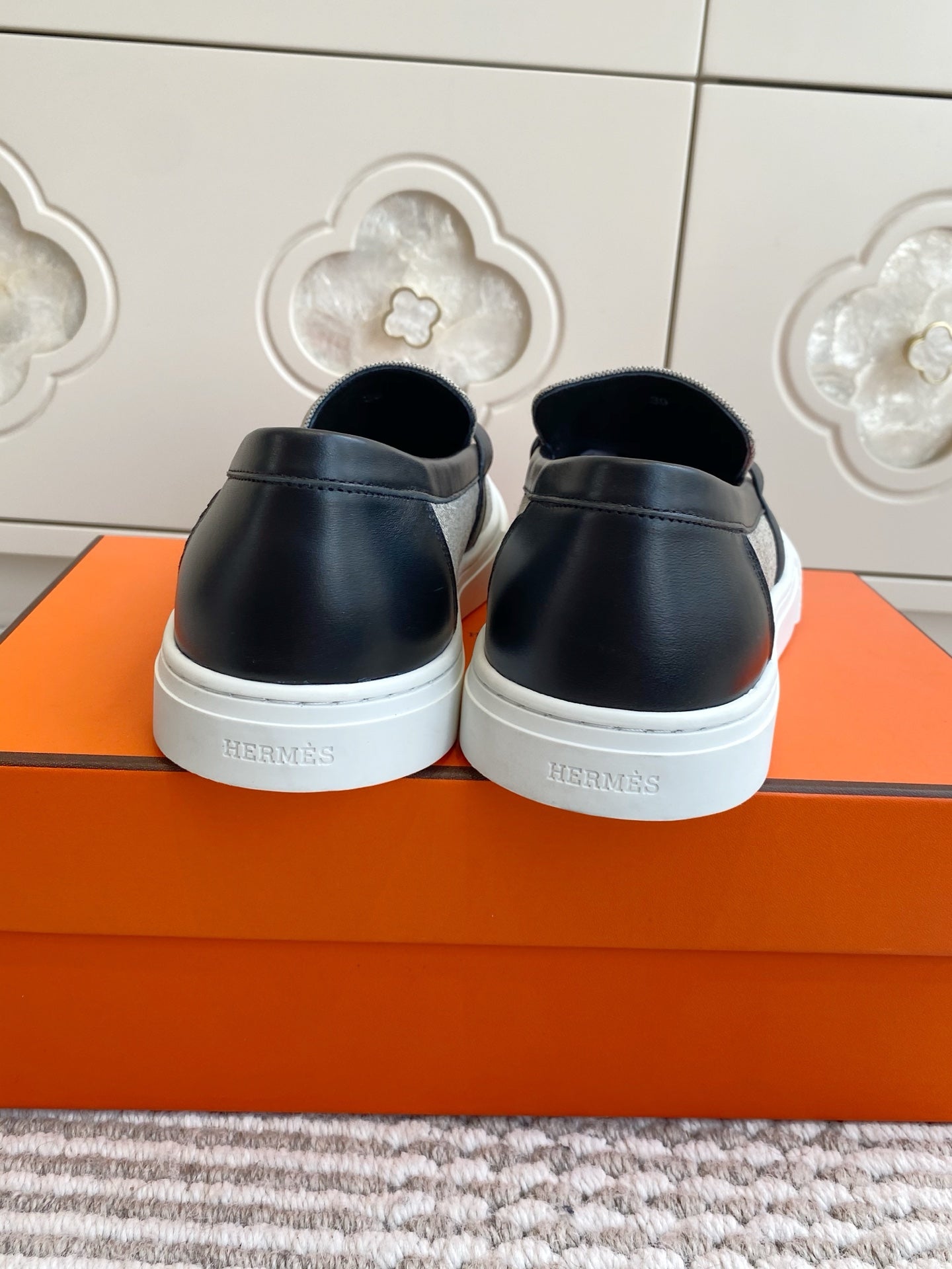 HERMES 25S SLIP-ON IN GREY CANVAS AND BLACK LAMBSKIN WITH SILVER HARDWARE