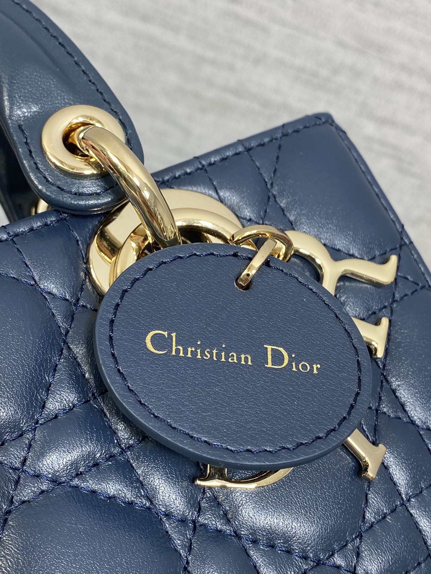 DIOR 25S SMALL LADY D‑JOY BAG 19 IN DARK BLUE CANNAGE CALFSKIN GOLD HARDWARE