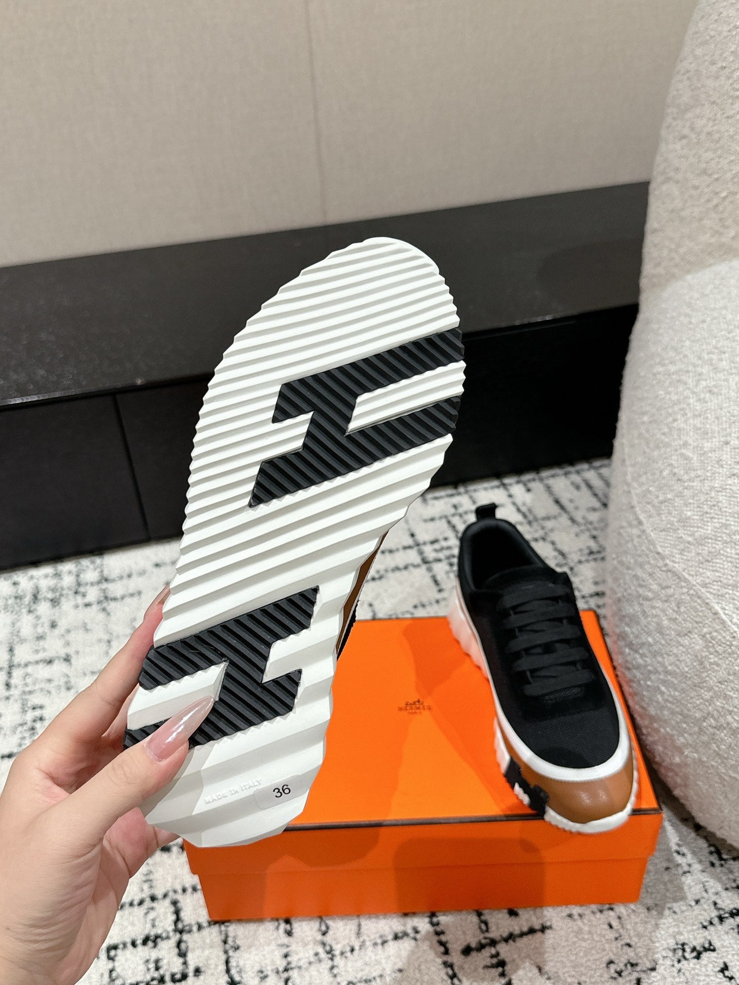HERMES BOUNCING SNEAKER IN BRONZE BROWN CALFSKIN AND BLACK FABRIC