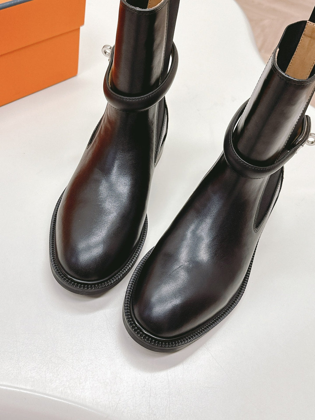 HERMES KELLY BUCKLE SHORT BOOTS IN BLACK CALFSKIN