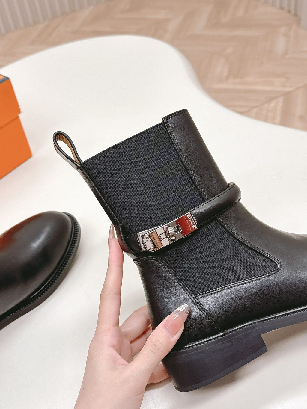 HERMES KELLY BUCKLE SHORT BOOTS IN BLACK CALFSKIN