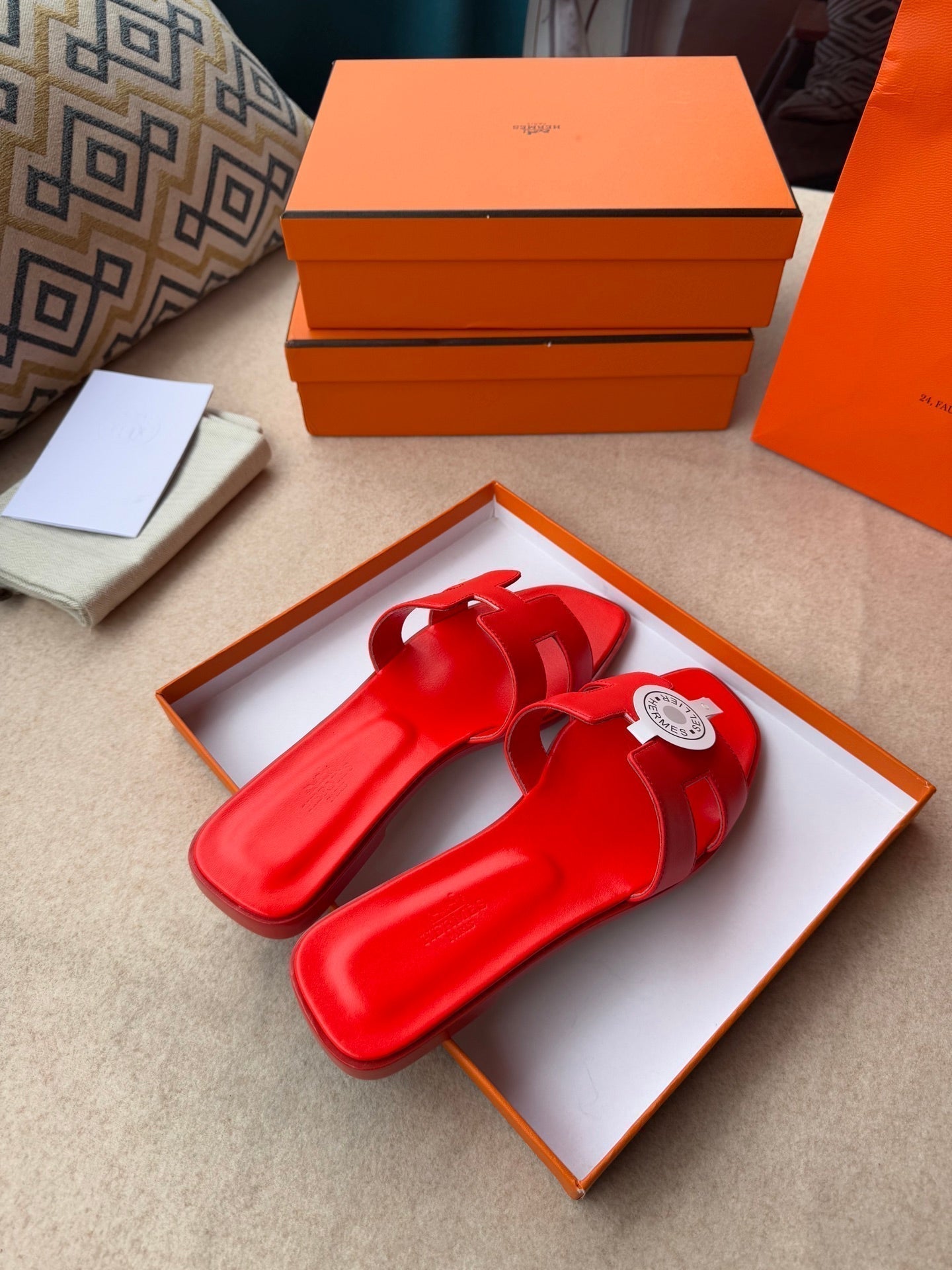 HERMES 0RAN SANDALS IN CHERRY RED CALFSKIN