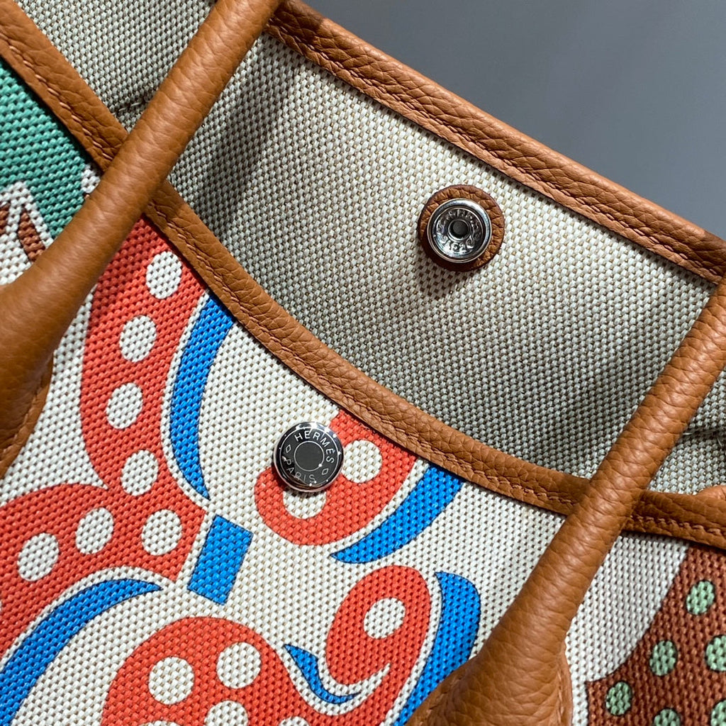 HERMES GARDEN PARTY 36 IN MULTICOLOR TOILE H CANVAS GOLD CALFSKIN CIRCUS TYPOGRAPHY PRINT