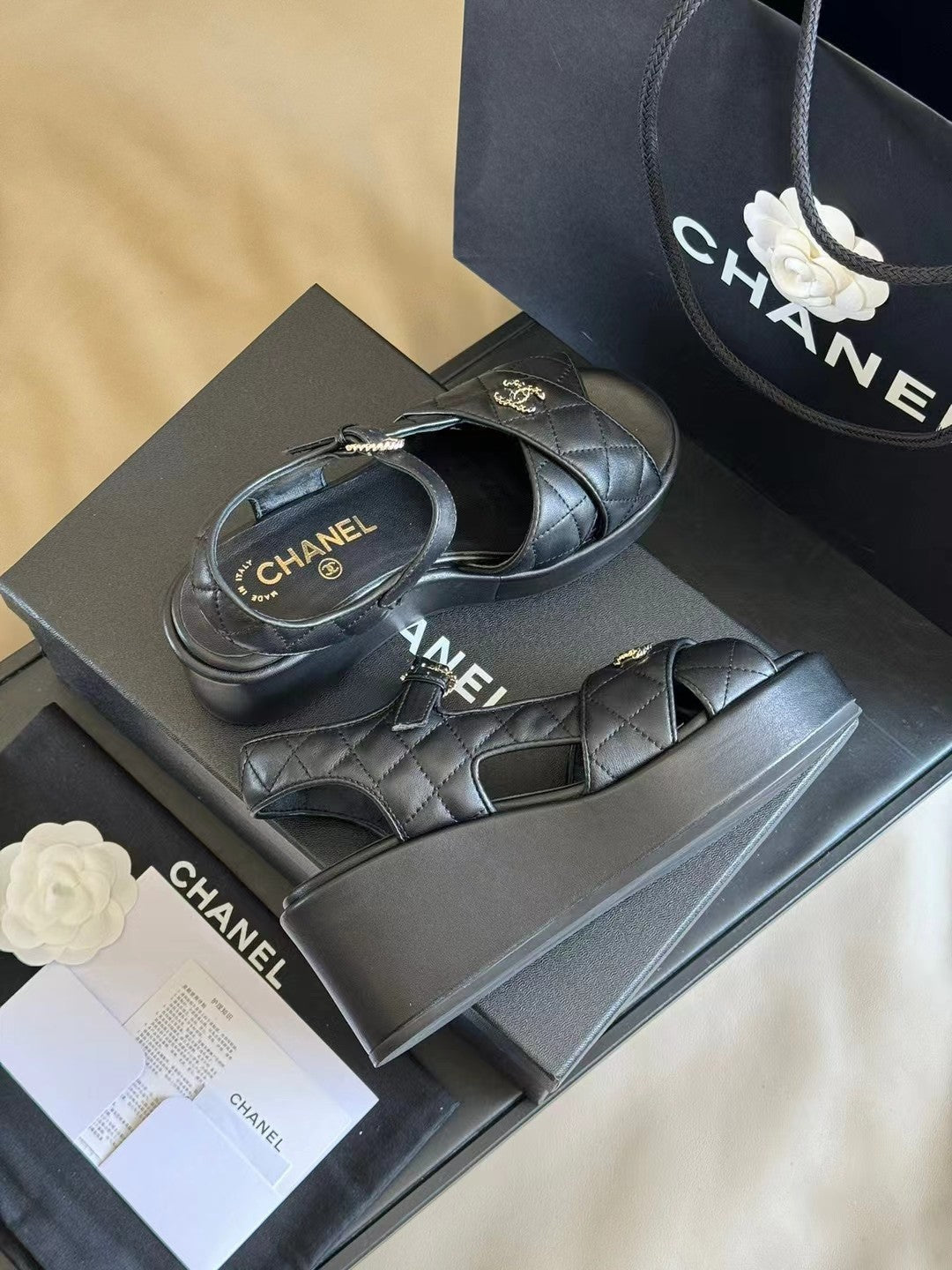 CHANEL CLASSIC WEDGE SANDALS IN BLACK LAMBSKIN