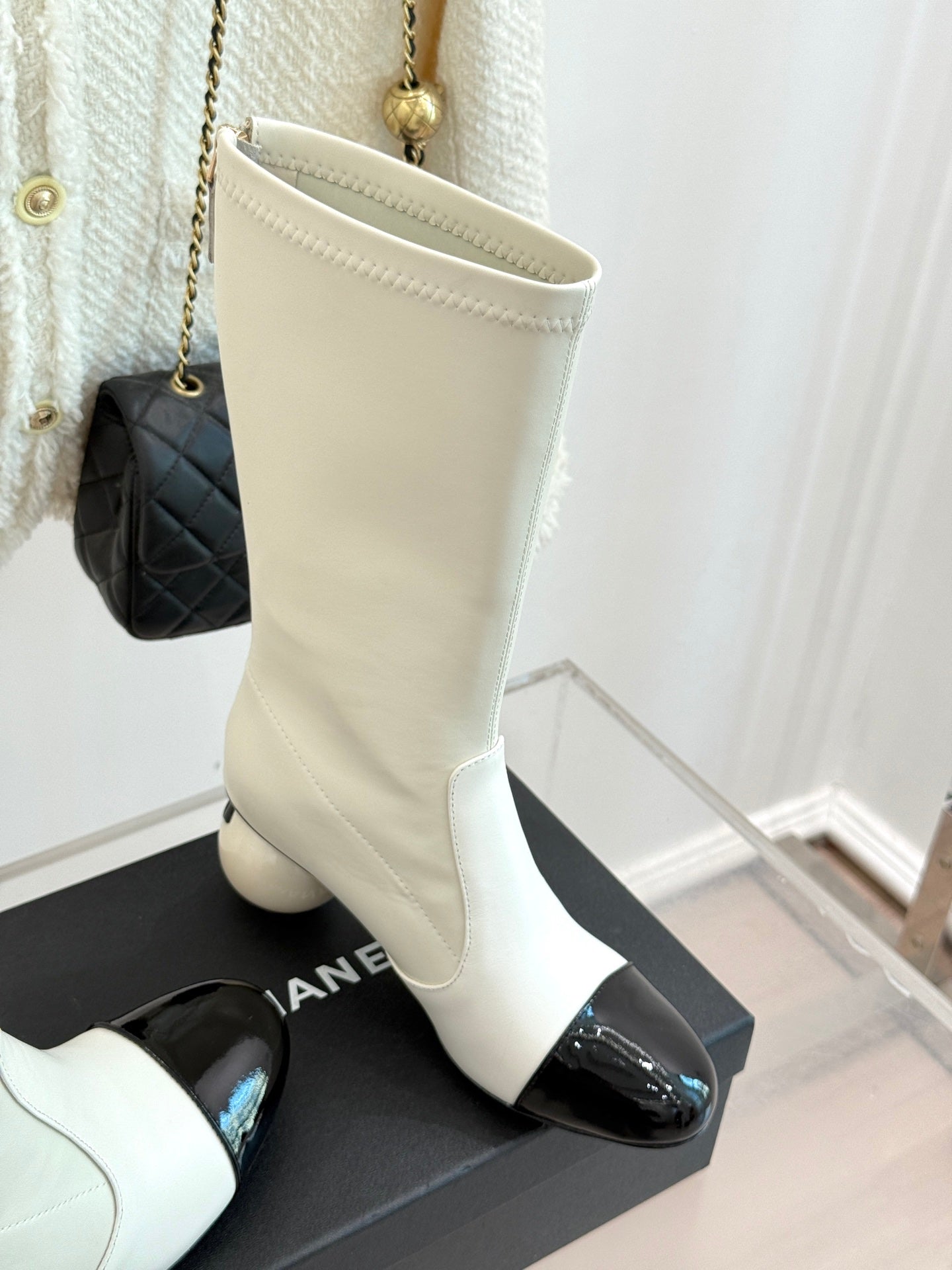CHANEL PEARL BOOTS IN WHITE CALFSKIN
