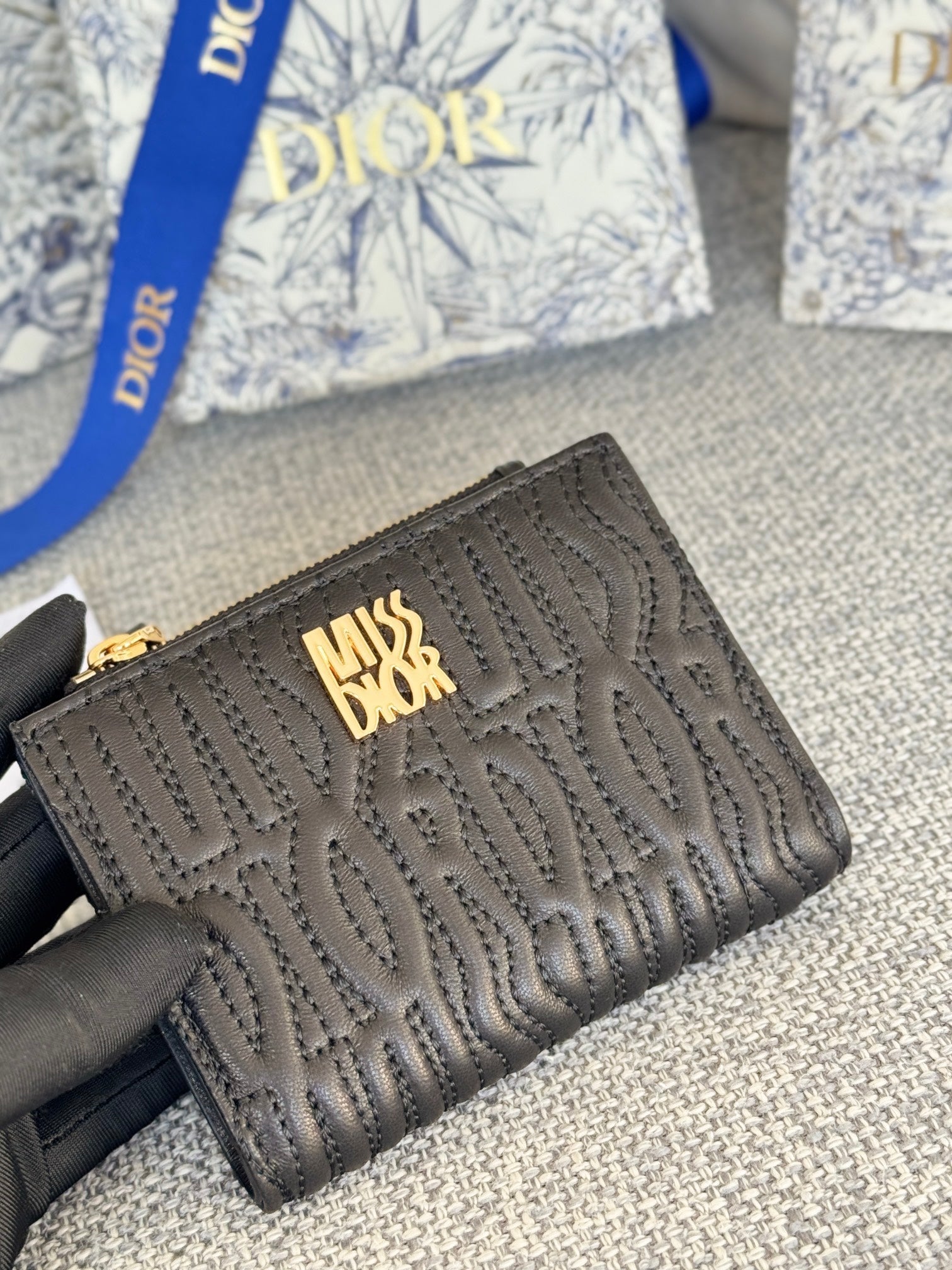 DIOR BIFOLD WALLET 11 IN BLACK QUILTED ALLOVER CALFSKIN