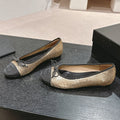 CHANEL BALLET FLATS IN GOLDEN GLITTERED TULLE AND BLACK SATIN