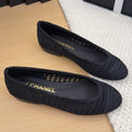 CHANEL BALLERINAS IN BLACK RAFFIA