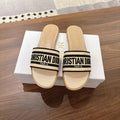 DIOR DWAY SLIDES IN BEIGE AND BLACK TECHNICAL FABRIC