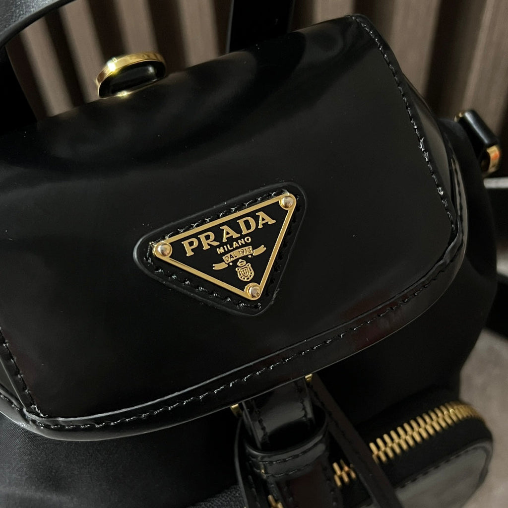 PRADA MINI BACKPACK 18 IN BLACK RE-NYLON AND GLOSSY CALFSKIN GOLD HARDWARE