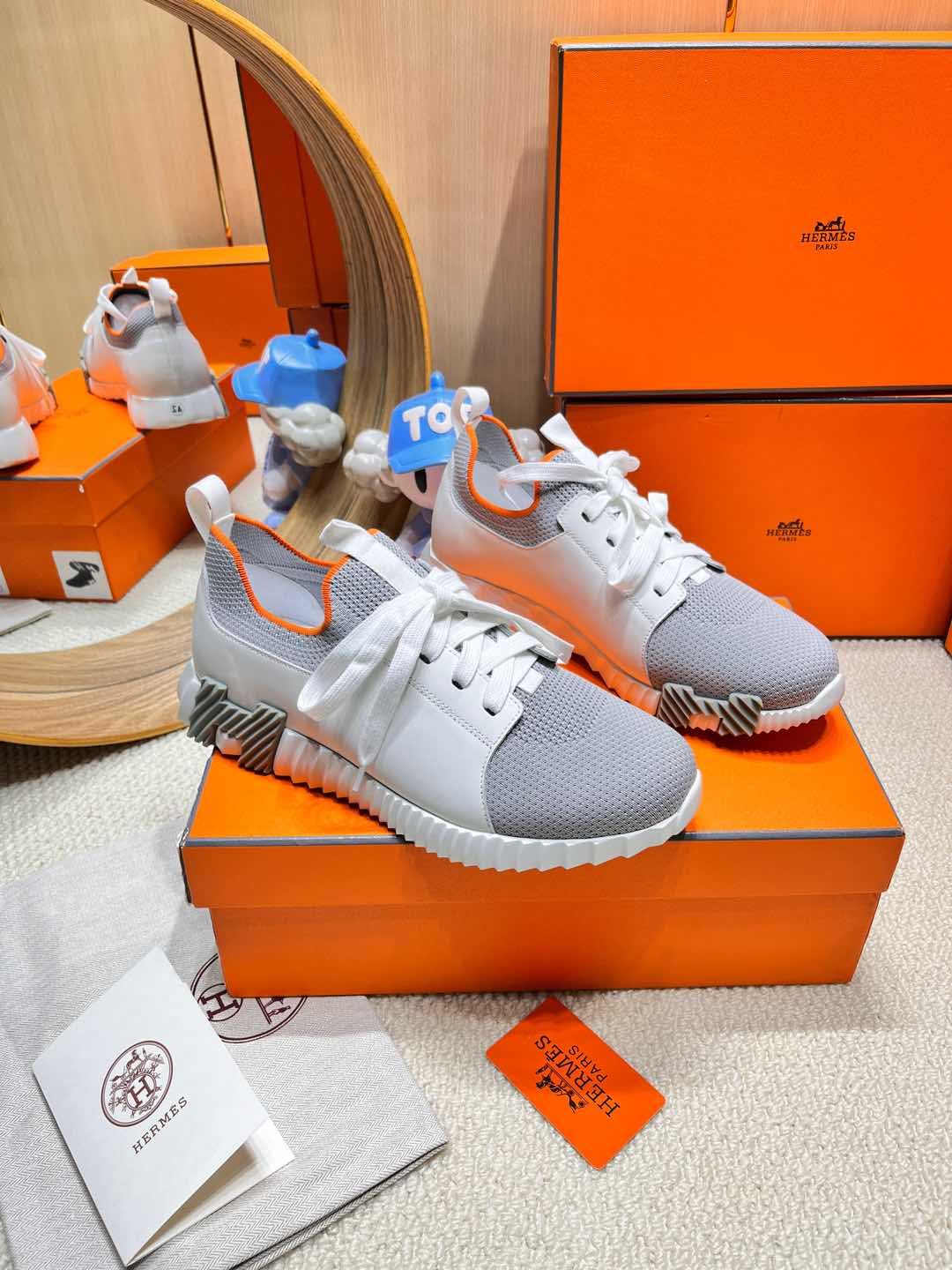 HERMES DEPART SLIP-ON SNEAKER IN WHITE MIX SHARK GRAY KNIT AND CALFSKIN