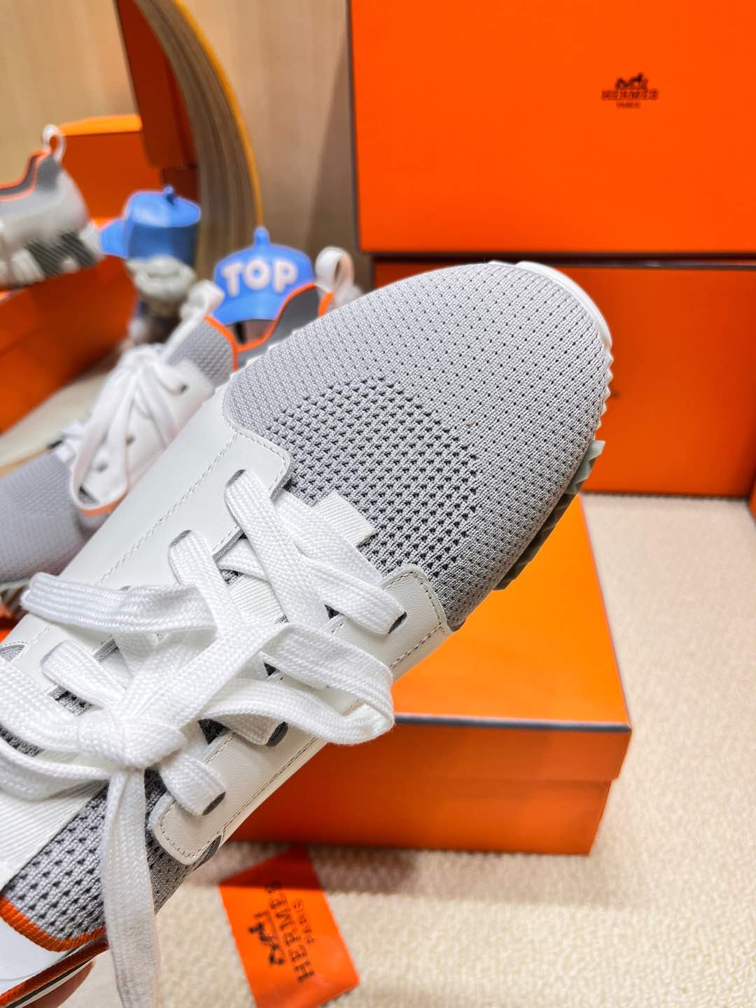HERMES DEPART SLIP-ON SNEAKER IN WHITE MIX SHARK GRAY KNIT AND CALFSKIN