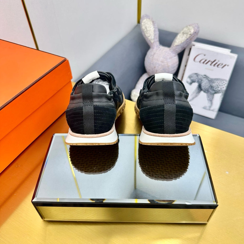 HERMES JET SNEAKER IN BLACK CALFSKIN AND SUEDE
