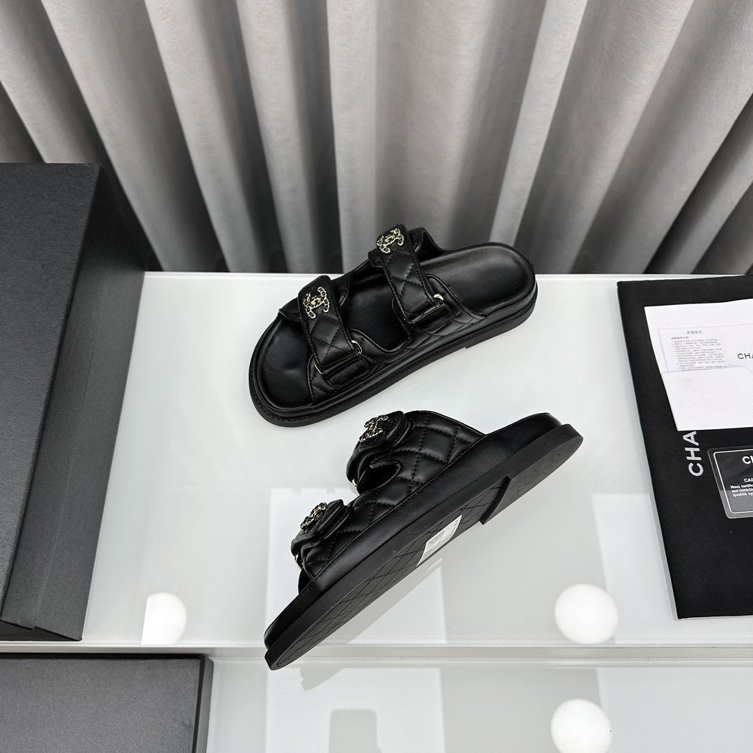 CHANEL dad sandals black lambskin mules
