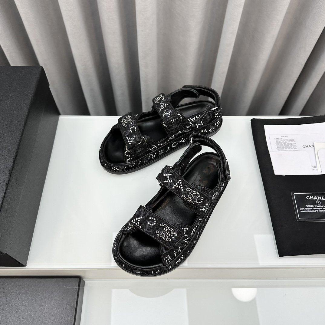 CHANEL dad sandals black denim mules